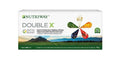 Packaging of Amway Nutriway Double X food supplement with a case, featuring a colorful logo and images of fruits and herbs.