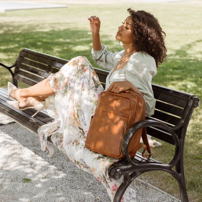 Azaria La Jolie on a park bench