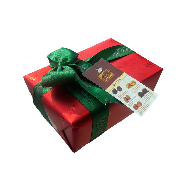 Bind Ballotin Assorted Filled Chocolates offer a luxurious selection of milk and dark chocolates with rich, creamy fillings.