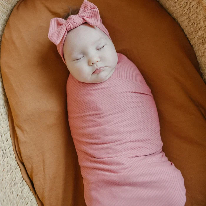 Baby wearing Copper Pearl Rib Knit Headband Bow - Rosewood