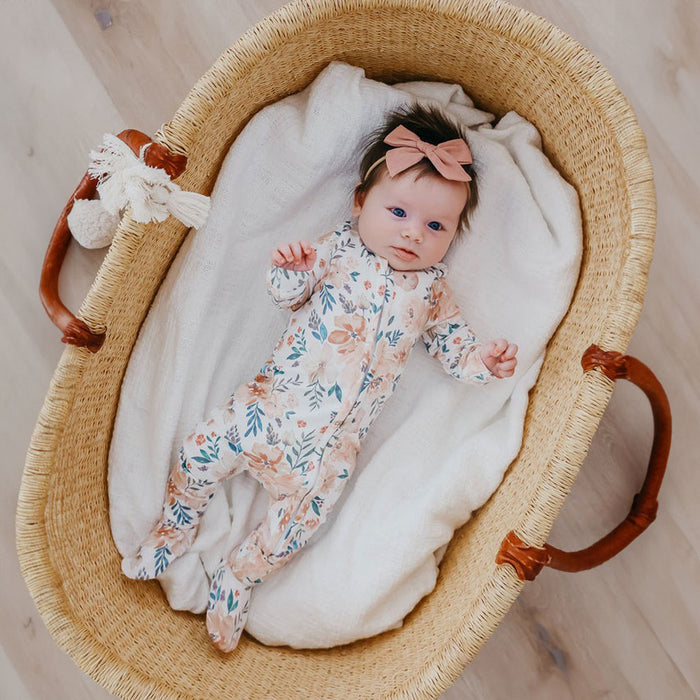 Baby girl wearing Copper Pearl Zip-up Footie - Autumn