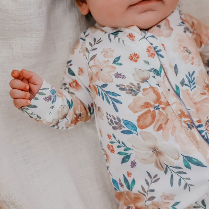 Baby girl wearing Copper Pearl Zip-up Footie - Autumn