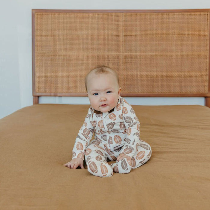 Baby wearing Copper Pearl Zip-up Footie - Blitz