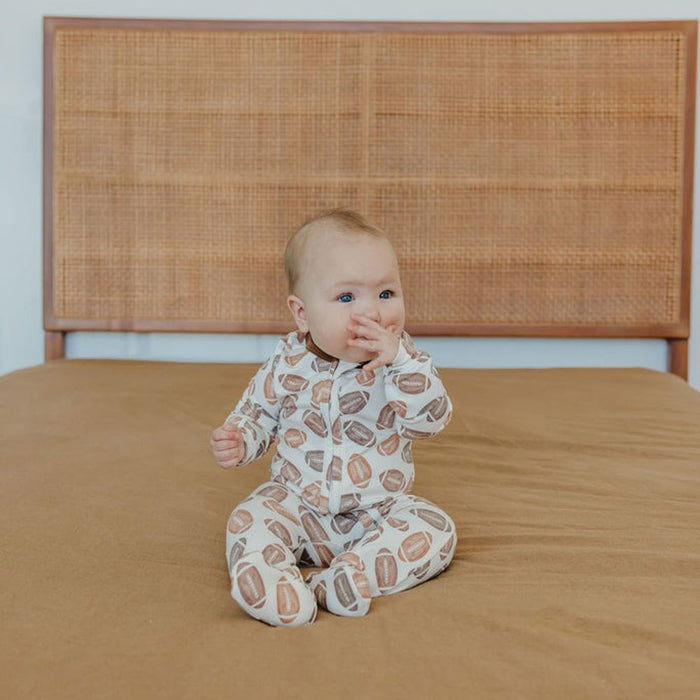Baby wearing Copper Pearl Zip-up Footie - Blitz