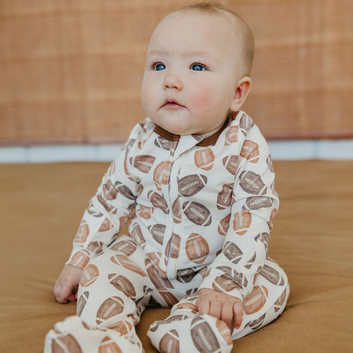 Baby wearing Copper Pearl Zip-up Footie - Blitz