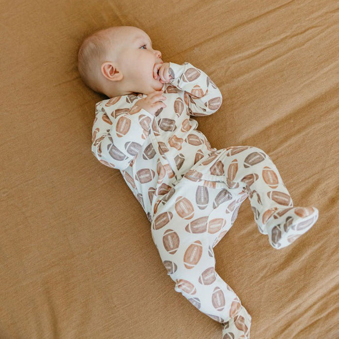 Baby wearing Copper Pearl Zip-up Footie - Blitz