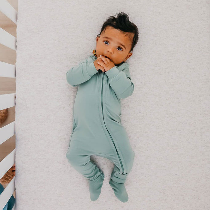 Baby wearing Copper Pearl Zip-up Footie - Briar