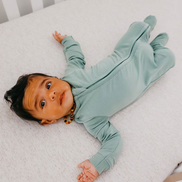 Baby wearing Copper Pearl Zip-up Footie - Briar