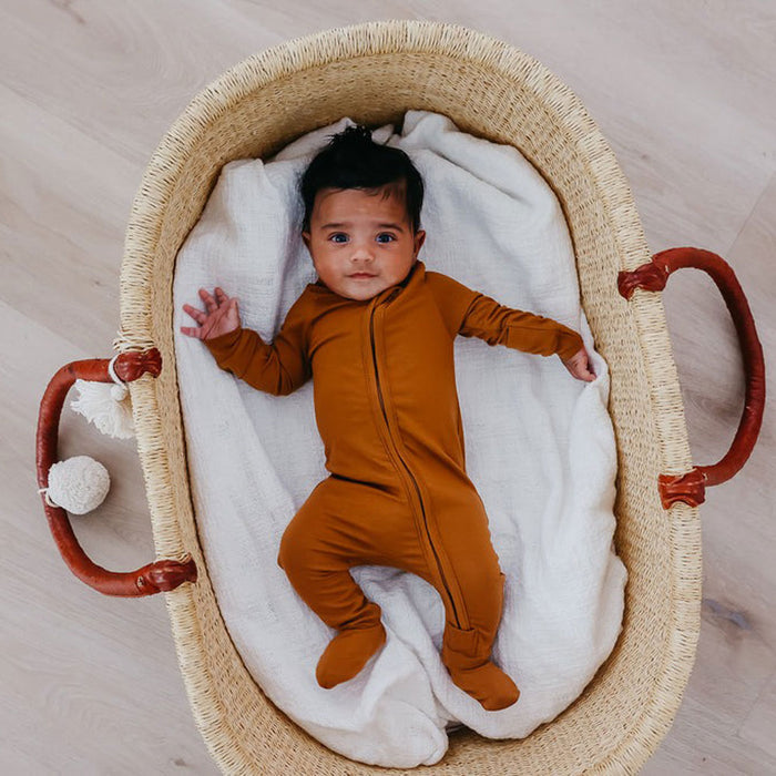 Baby wearing Copper Pearl Zip-up Footie - Camel