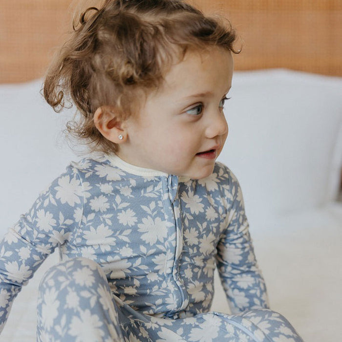 Little girl wearing Copper Pearl Zip-up Footie - Lacie