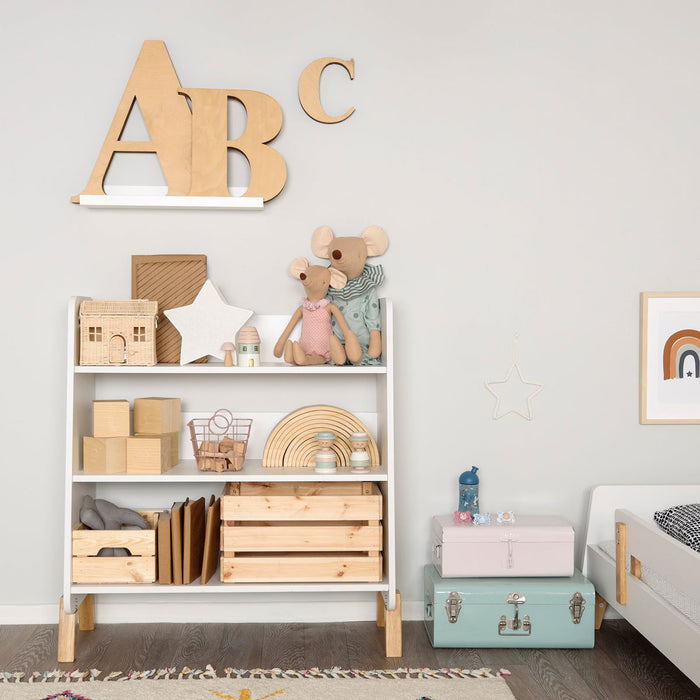 Toys displayed on Dadada Muse Bookshelf - White / Natural in bedroom