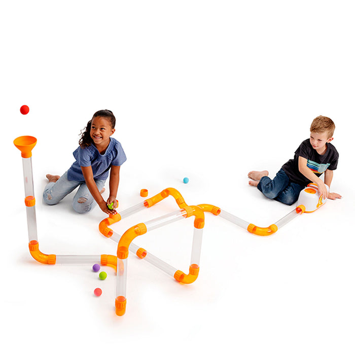 Two kids play with Fat Brain Toys Air Toobz Extension Set