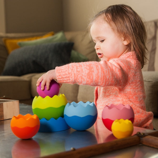 Child Playing with Fat Brain Toys Tobbles Neo
