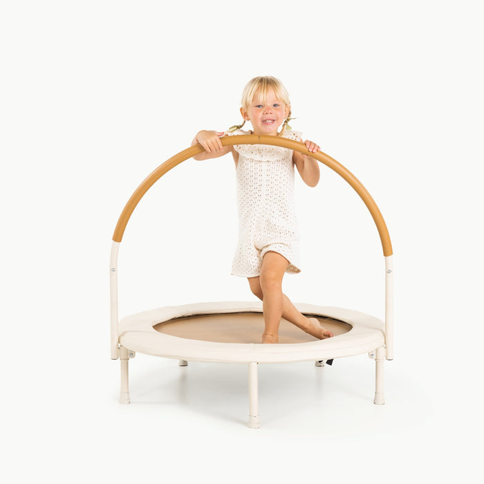Little girl stands on Gathre Trampoline