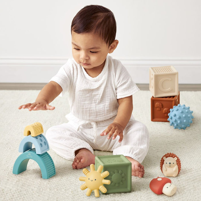 Toddler plays with Itzy Ritzy Itzy Blocks - Friends