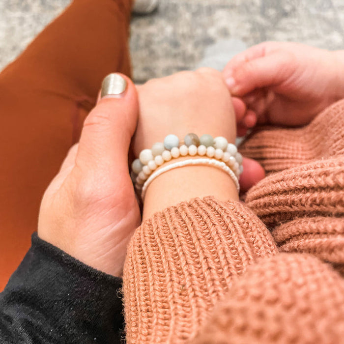 Little girl wearing Joyful Bead Company Frosted Blaire Bracelet