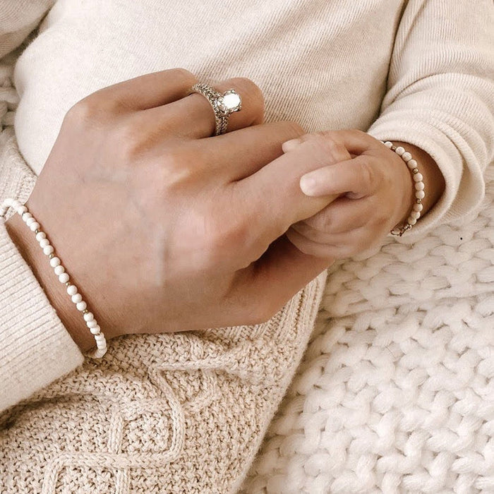 Baby and mom wear matching Joyful Bead Company Goldie Dot Bracelet