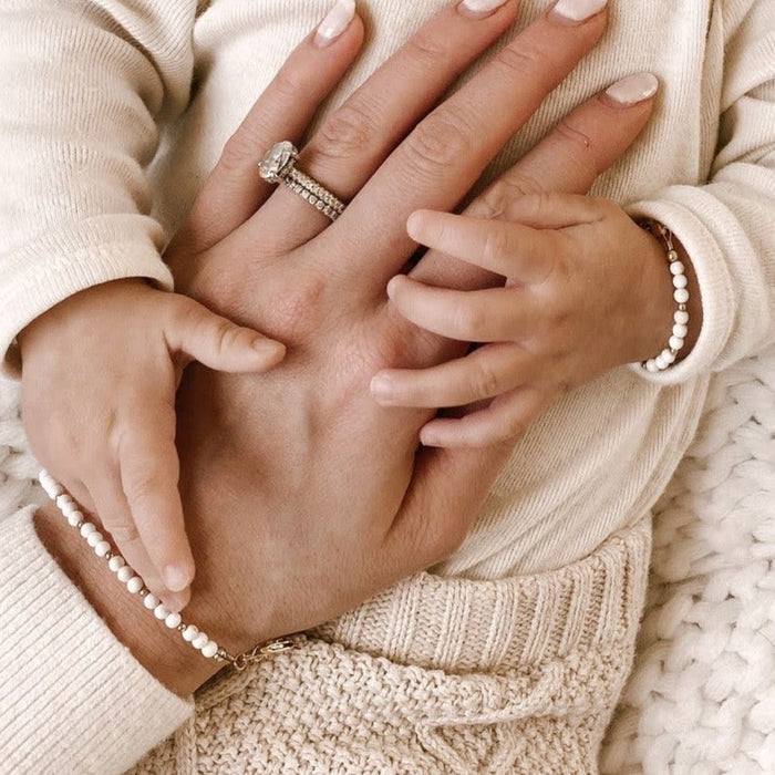 Baby and mom wear matching Joyful Bead Company Goldie Dot Bracelet