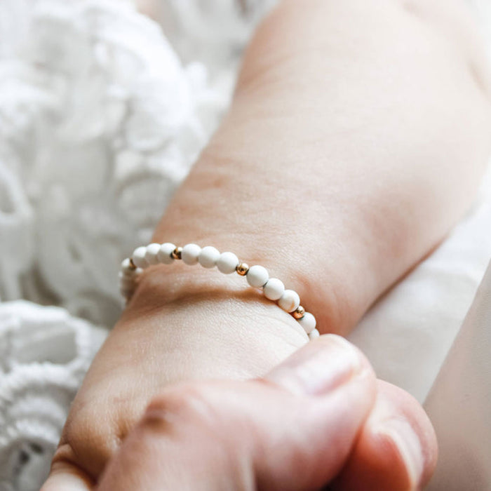 Baby wears Joyful Bead Company Goldie Dot Bracelet