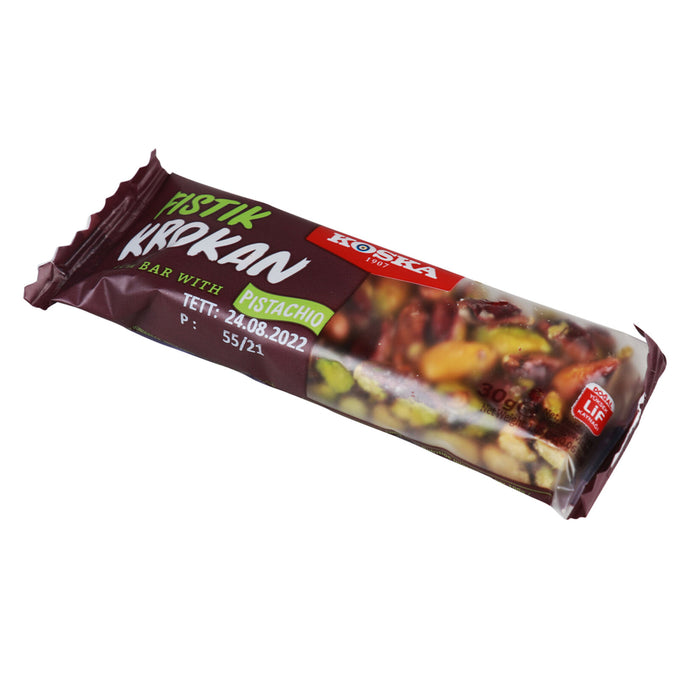 Koska Pistachio Brittle Bar is a deliciously crunchy treat made with 60% premium Antep pistachios, natural honey, and sugar.