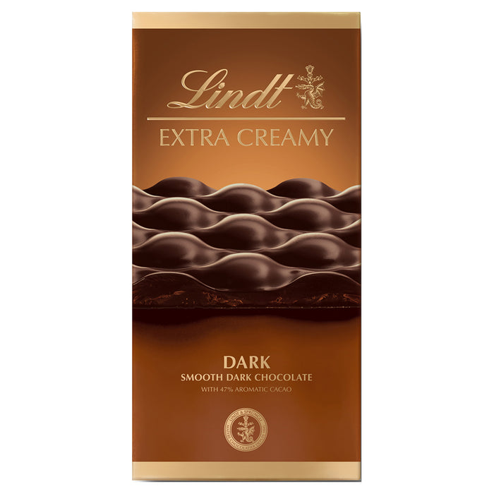 Lindt Extra Creamy Dark Smooth Chocolate Bar delivers a luxurious blend of rich dark chocolate and velvety creaminess.