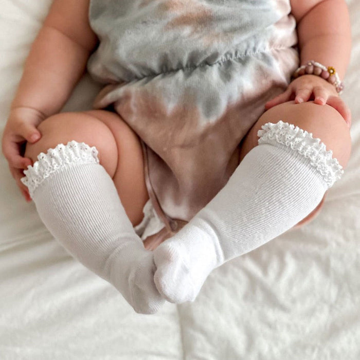Little girl wearing Little Stocking Co Knee High Socks - White Lace Top