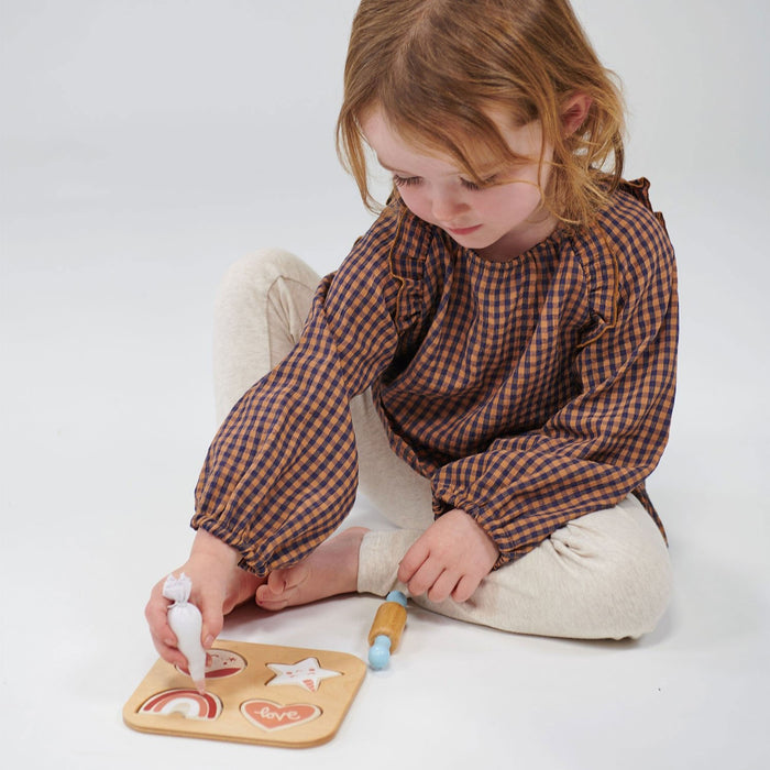 Child plays with Mentari Toys Cookie Cutting Set