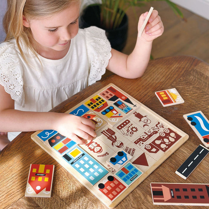 Little girl plays with Mentari Toys Town Puzzle