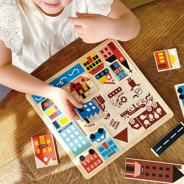 Little girl plays with Mentari Toys Town Puzzle