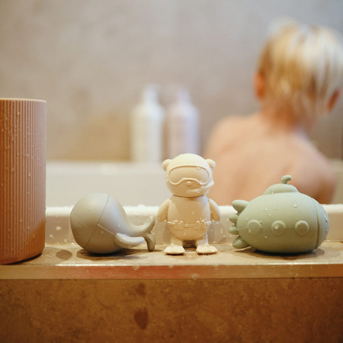 Child playing in bath with Mushie Mold Free Bath Play Set - 4 Pack - Sealife