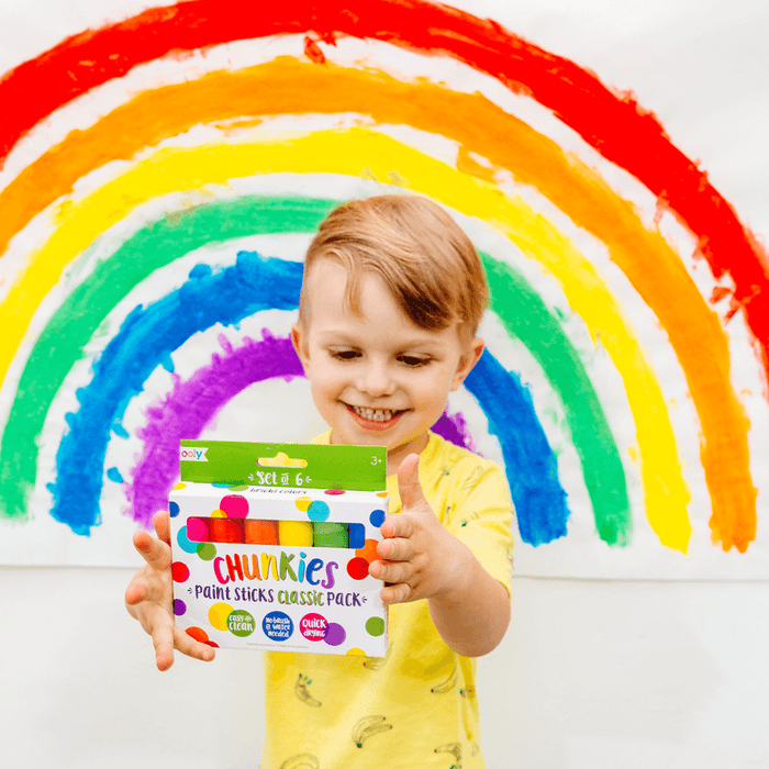 Child Holding OOLY Chunkies Paint Sticks Classic - Set of 6