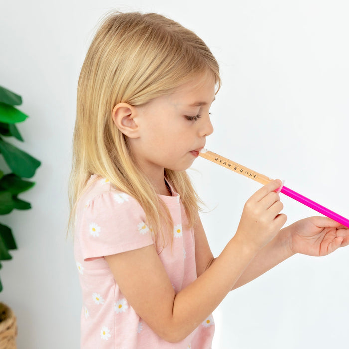 Little girl using Ryan and Rose Cutie Dose - Oral Liquid Dispenser - Lollipop