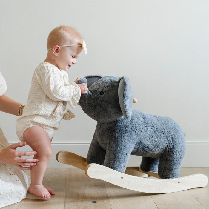 Little girl plays with Saranoni Stuffed Animal Rocker - Elephant