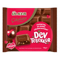 Ulker Filled Chocolate is a delightful treat combining smooth milk chocolate with a rich, nutty filling and crisped rice for a satisfying crunch.