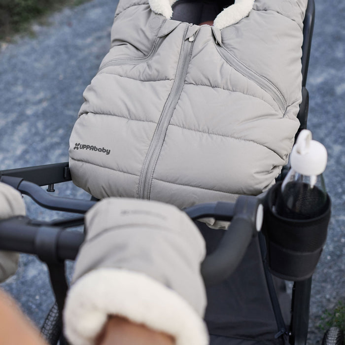 Woman pushing baby in stroller with UPPAbaby CozyGanoosh - MESA / ARIA - STELLA (Grey Brushed Melange)