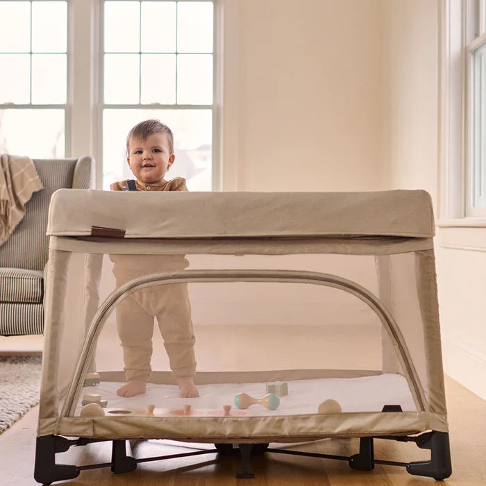 UPPAbaby Waterproof Mattress Cover - REMI - toddler standing inside