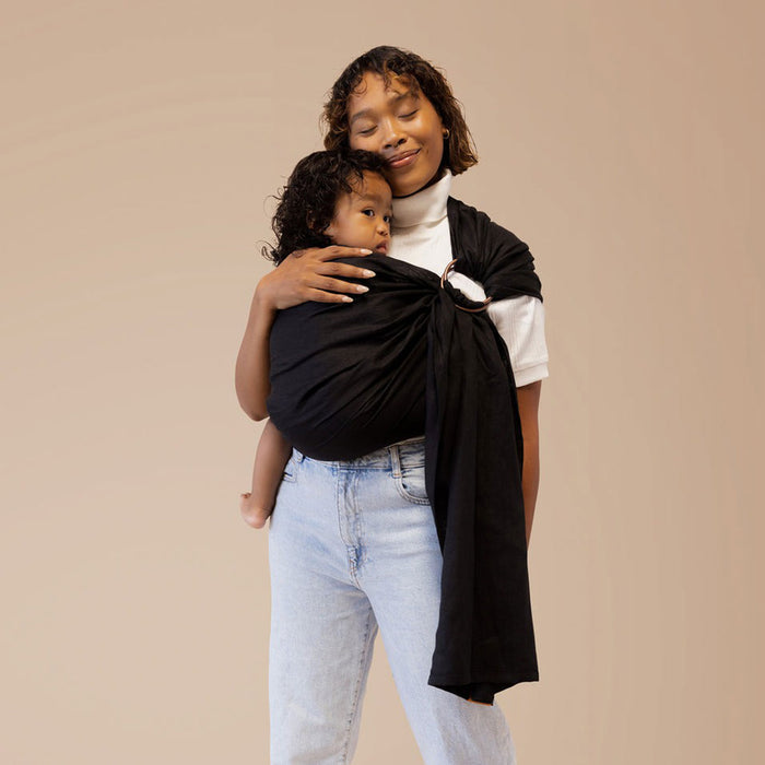 Mom wearing toddler in WildBird Linen Sling - Raven